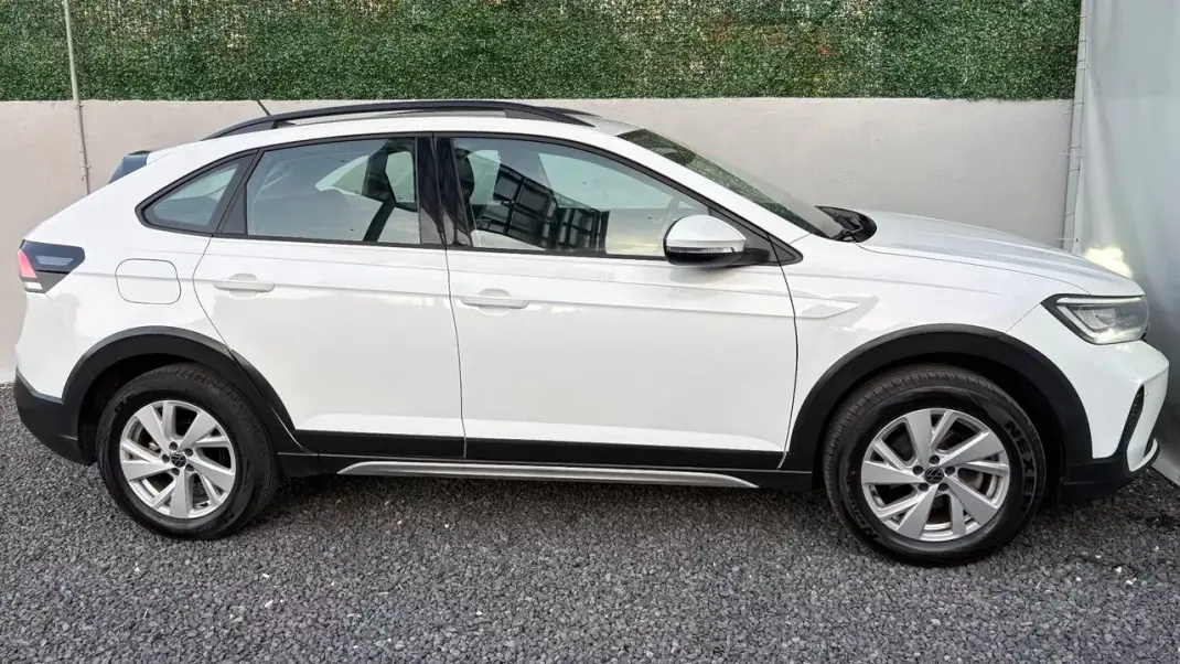 Volkswagen Taigo 2022 - 16400 EUR, 96500 km - AUTO.MOTO.pt - 96500km - foto 7 de 12