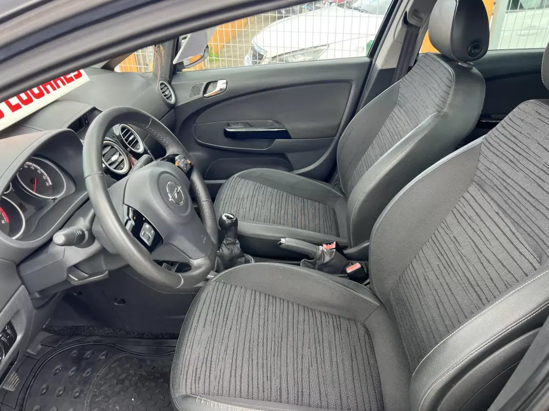 Opel Corsa 2014 - 6450 EUR, 136121 km - AUTO.MOTO.pt - 136121km - foto 16 de 23