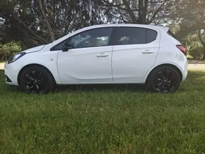 Opel Corsa 2017 - 12900 EUR, 58750 km - AUTO.MOTO.pt - 58750km - foto 12 de 34