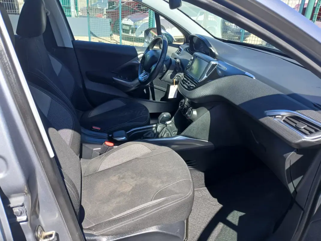Peugeot 2008 2016 - 8250 EUR, 93942 km - 93942km - foto 22 de 25