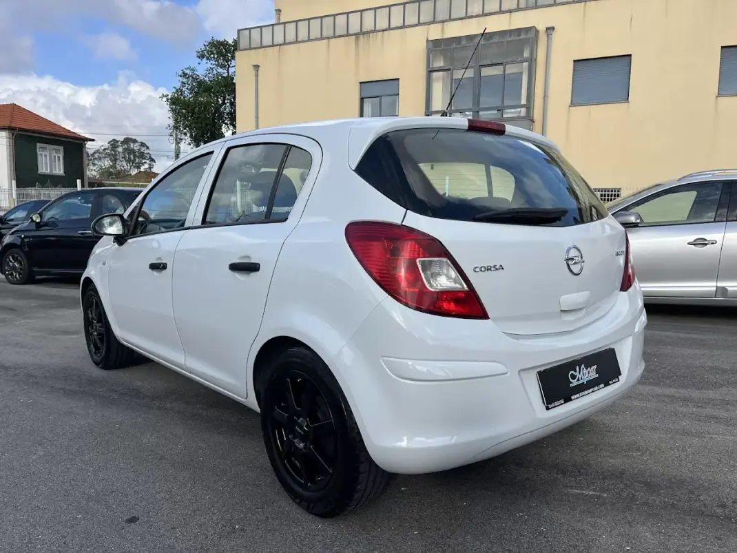 Opel Corsa 2011 - 6450 EUR, 117000 km - AUTO.MOTO.pt - 117000km - foto 7 de 50