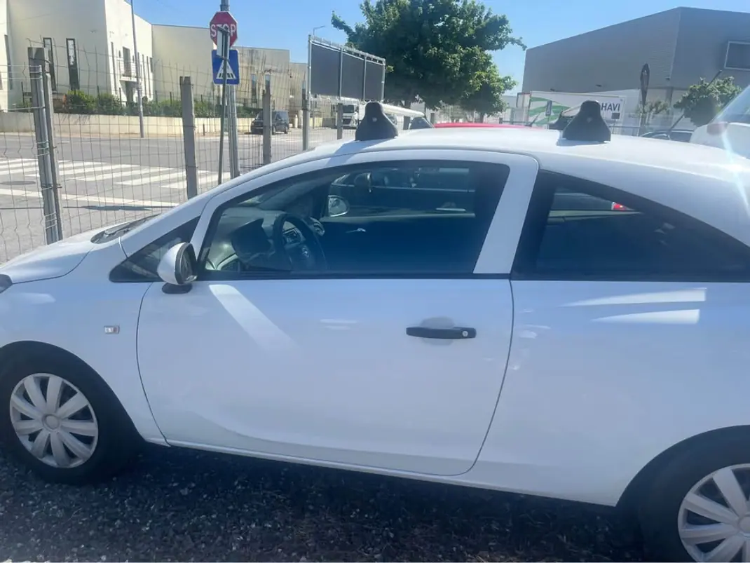 Opel Corsa E Van 2017 - 4650 EUR, 225590 km - AUTO.MOTO.pt - 225590km - foto 4 de 15
