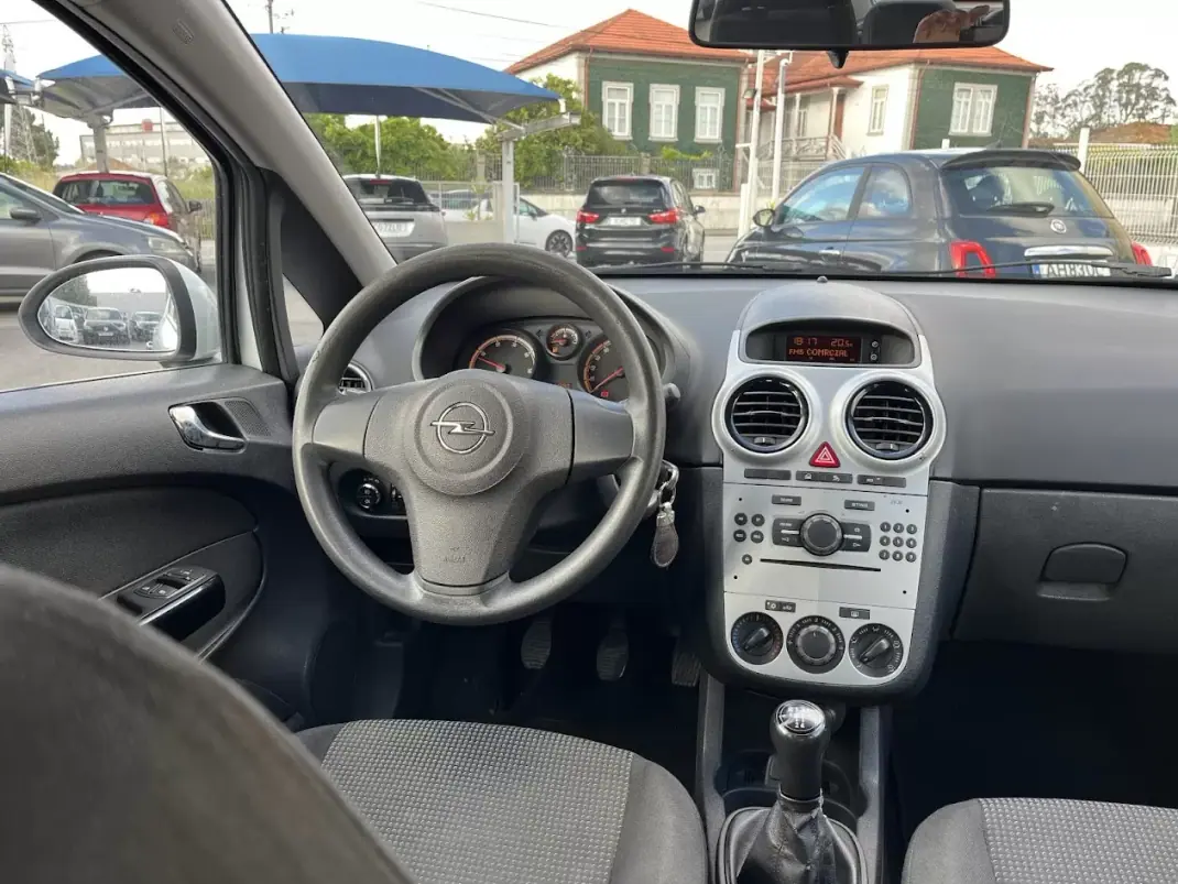 Opel Corsa 2011 - 6450 EUR, 117000 km - AUTO.MOTO.pt - 117000km - foto 11 de 50