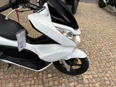 Honda PCX 125 2012 - 1900 EUR, 64269 km - AUTO.MOTO.pt - 64269km - foto 10 de 12