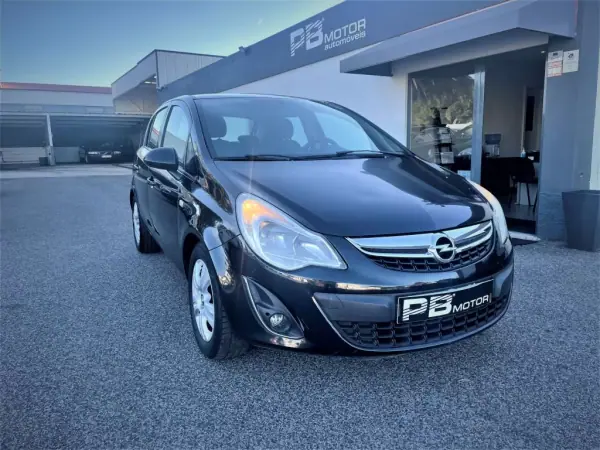 Opel Corsa 2013 - 9750 EUR, 171082 km - AUTO.MOTO.pt - 171082km - foto 5 de 12