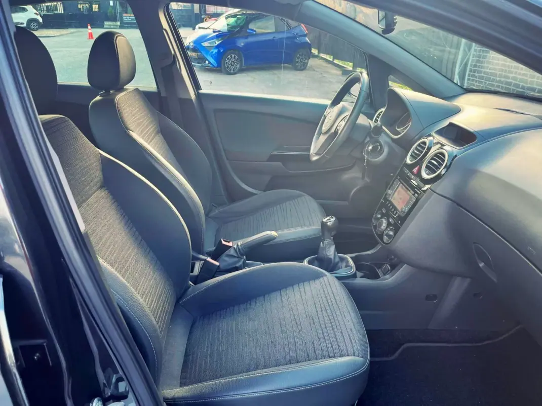 Opel Corsa 2014 - 7750 EUR, 108000 km - AUTO.MOTO.pt - 108000km - foto 10 de 12