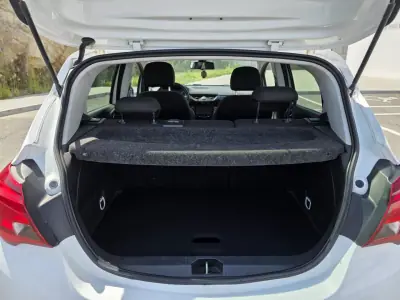 Opel Corsa 2016 - 9900 EUR, 129000 km - AUTO.MOTO.pt - 129000km - foto 10 de 15