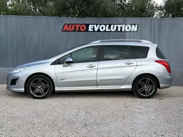 Peugeot 308 SW 2013 — foto 2 de 29