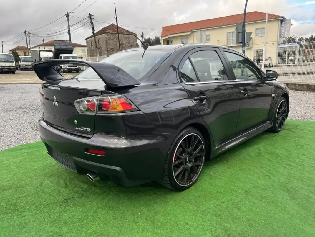 Mitsubishi Lancer 2011 - 54990 EUR, 90000 km - 90000km - foto 6 de 19