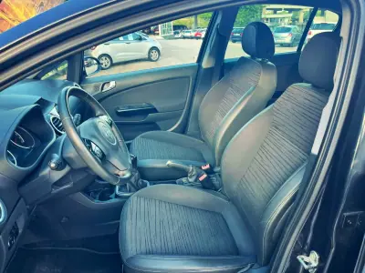 Opel Corsa 2014 - 7750 EUR, 108000 km - AUTO.MOTO.pt - 108000km - foto 7 de 12