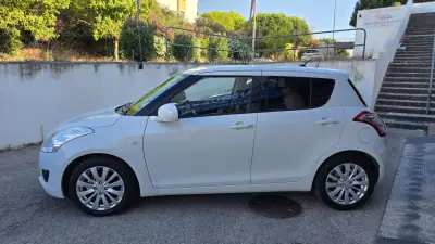 Suzuki Swift 2010 - 8990 EUR, 102000 km - AUTO.MOTO.pt - 102000km - foto 27 de 28