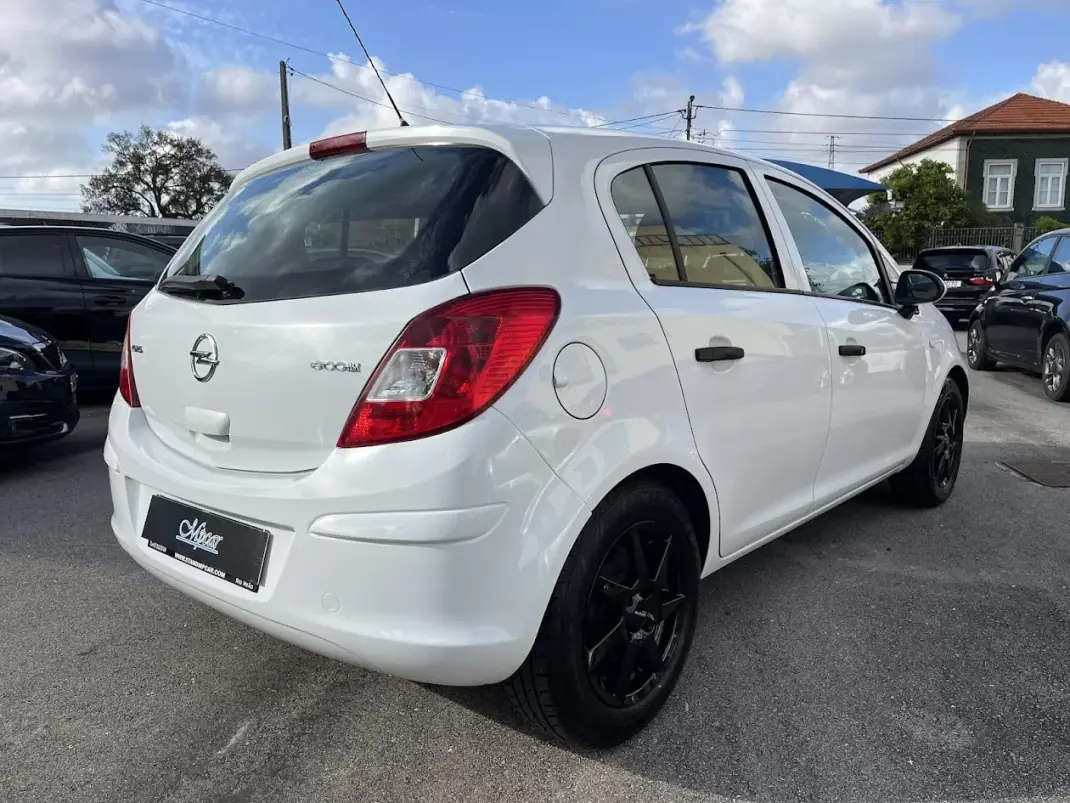 Opel Corsa 2011 - 6450 EUR, 117000 km - AUTO.MOTO.pt - 117000km - foto 5 de 50