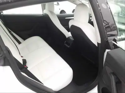 Tesla Model 3 2021 - 27980 EUR, 77857 km - AUTO.MOTO.pt - 77857km - foto 7 de 10