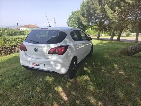 Opel Corsa 2017 - 12900 EUR, 58750 km - AUTO.MOTO.pt - 58750km - foto 11 de 34