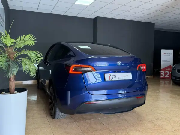 Tesla Model Y 2022 - 37990 EUR, 52574 km - AUTO.MOTO.pt - 52574km - foto 4 de 15