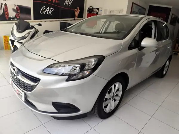 Opel Corsa 2018 - 10980 EUR, 118000 km - AUTO.MOTO.pt - 118000km - foto 9 de 23