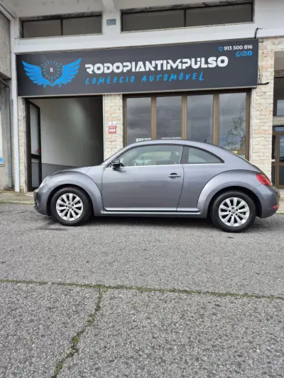 Volkswagen New Beetle 2013 - 13950 EUR, 142000 km - AUTO.MOTO.pt - 142000km - foto 2 de 34