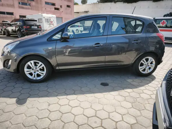 Opel Corsa 2011 - 6900 EUR, 189500 km - AUTO.MOTO.pt - 189500km - foto 2 de 14