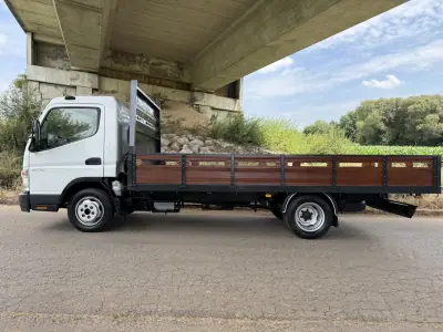 Mitsubishi FUSO CANTER 3C13 6 VEL LONGA 5,75M 2009 - 23900 EUR, 189000 km - AUTO.MOTO.pt - 189000km - foto 4 de 23