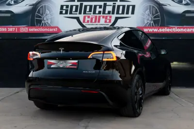 Tesla Model Y 2022 - 38900 EUR, 54000 km - AUTO.MOTO.pt - 54000km - foto 7 de 23