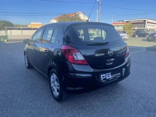 Opel Corsa 2013 - 9750 EUR, 171082 km - AUTO.MOTO.pt - 171082km - foto 8 de 12