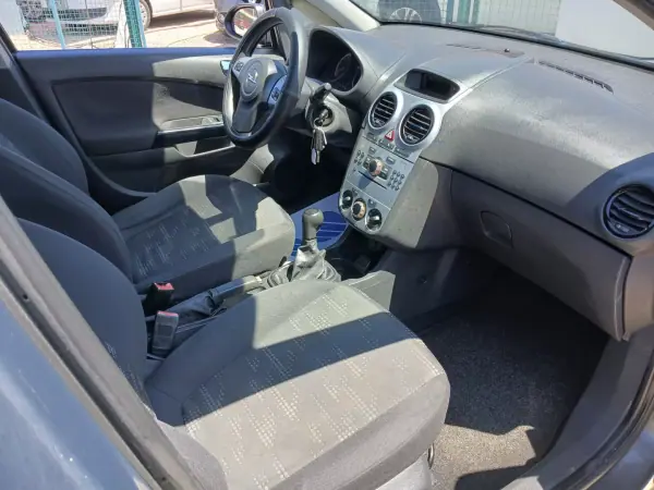 Opel Corsa 2014 - 5650 EUR, 148851 km - AUTO.MOTO.pt - 148851km - foto 23 de 25