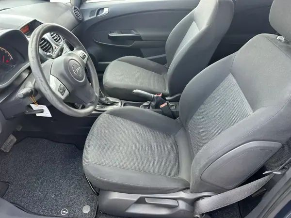 Opel Corsa 2013 - 8490 EUR, 110000 km - AUTO.MOTO.pt - 110000km - foto 10 de 16