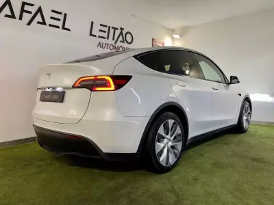Tesla Model Y 2023 - 35450 EUR, 75000 km - AUTO.MOTO.pt - 75000km - foto 9 de 39
