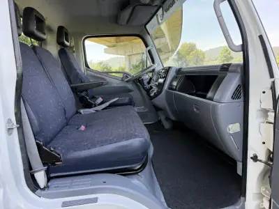 Mitsubishi FUSO CANTER 3C13 BASCULANTE 2010 - 28990 EUR, 116000 km - AUTO.MOTO.pt - 116000km - foto 12 de 23