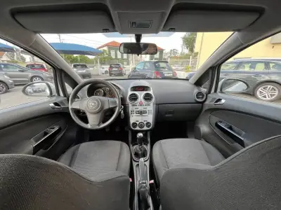 Opel Corsa 2011 - 6450 EUR, 117000 km - AUTO.MOTO.pt - 117000km - foto 10 de 50