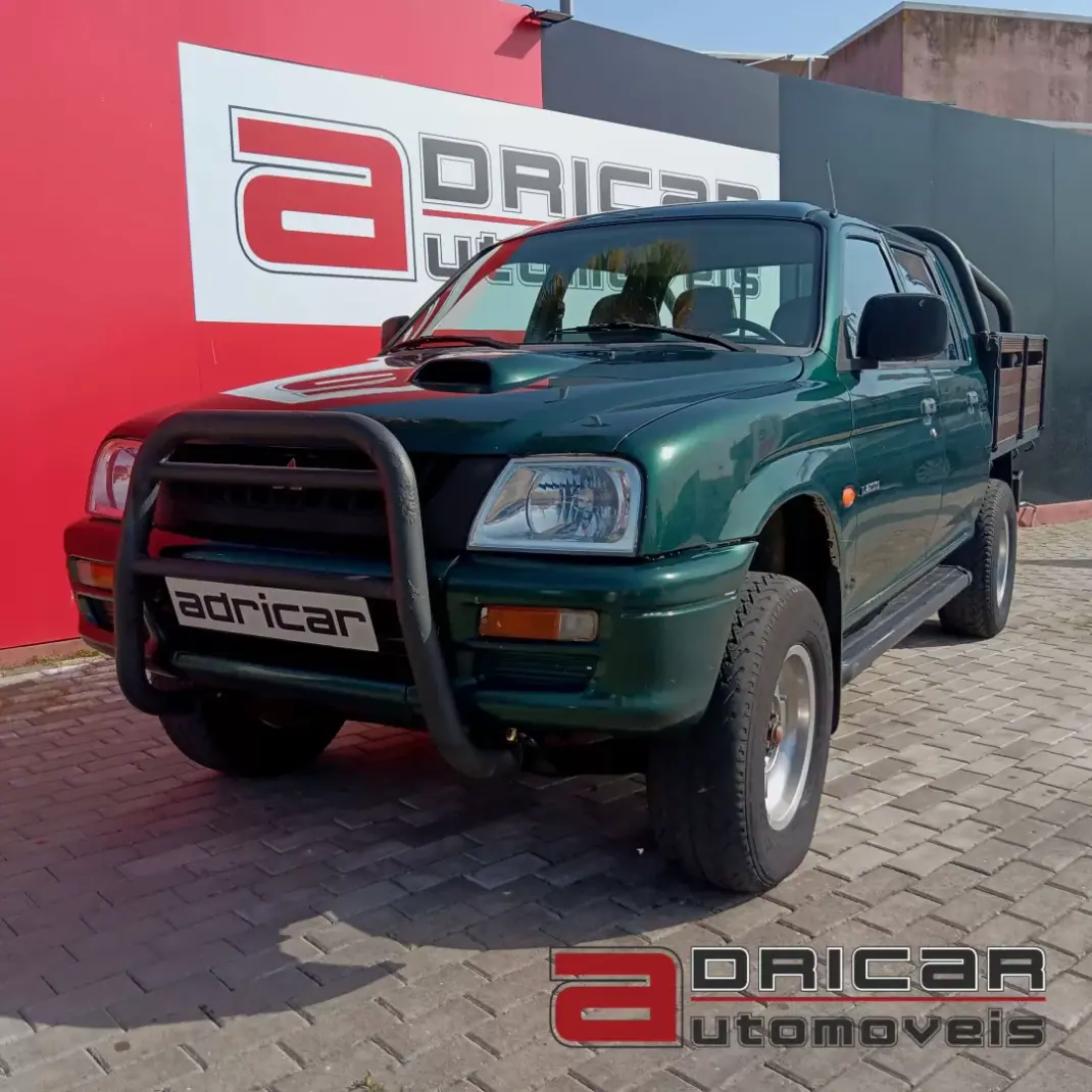 Mitsubishi L200 1998 - 9900 EUR, 470989 km - AUTO.MOTO.pt - 470989km - foto 1 de 12