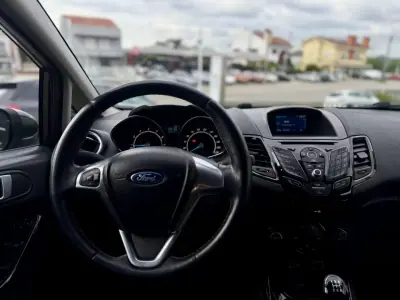 Ford Fiesta 2016 - 9950 EUR, 92000 km - AUTO.MOTO.pt - 92000km - foto 16 de 26