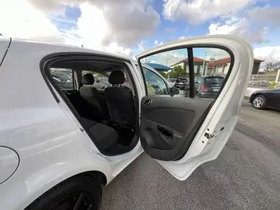 Opel Corsa 2011 - 6450 EUR, 117000 km - AUTO.MOTO.pt - 117000km - foto 31 de 50