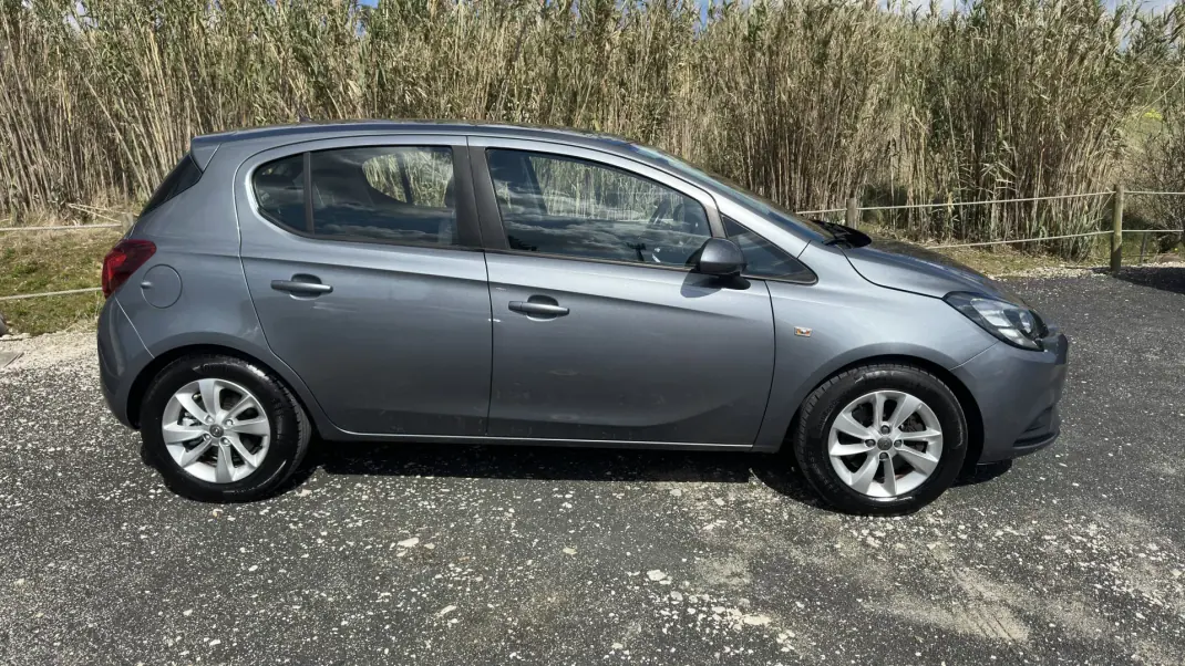 Opel Corsa 2018 - 10490 EUR, 161000 km - AUTO.MOTO.pt - 161000km - foto 4 de 15