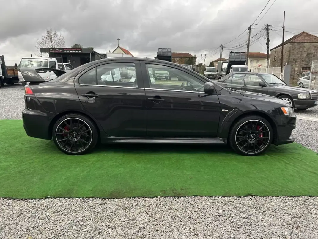 Mitsubishi Lancer 2011 - 54990 EUR, 90000 km - 90000km - foto 7 de 19