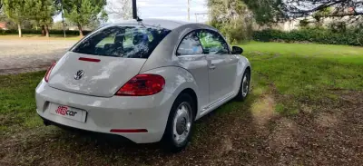 Volkswagen New Beetle 2015 - 14950 EUR, 156200 km - AUTO.MOTO.pt - 156200km - foto 12 de 39
