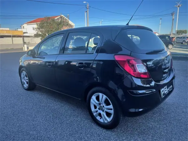 Opel Corsa 2013 - 9750 EUR, 171082 km - AUTO.MOTO.pt - 171082km - foto 6 de 12