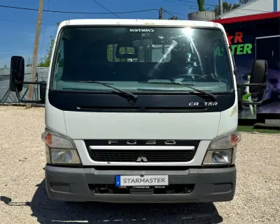 Mitsubishi Canter 3.0 Di-D Tribasculante 2010 - 11940 EUR, 500000 km - AUTO.MOTO.pt - 500000km - foto 2 de 14