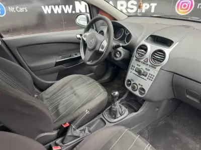 Opel Corsa 2010 - 3900 EUR, 271376 km - AUTO.MOTO.pt - 271376km - foto 7 de 10