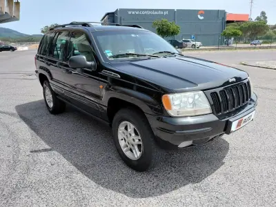 Jeep Grand Cherokee 2000 - 6490 EUR, 221450 km - AUTO.MOTO.pt - 221450km - foto 18 de 39