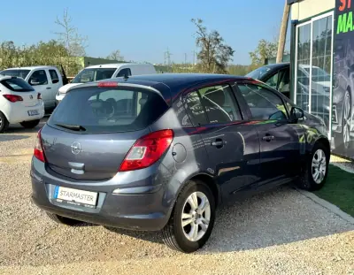 Opel Corsa 2010 - 4980 EUR, 103125 km - AUTO.MOTO.pt - 103125km - foto 8 de 17