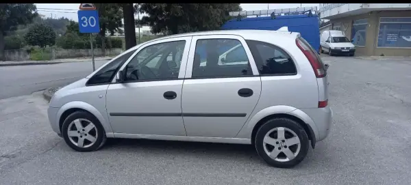 Opel Meriva 2005 - 4490 EUR, 248878 km - AUTO.MOTO.pt - 248878km - foto 6 de 10