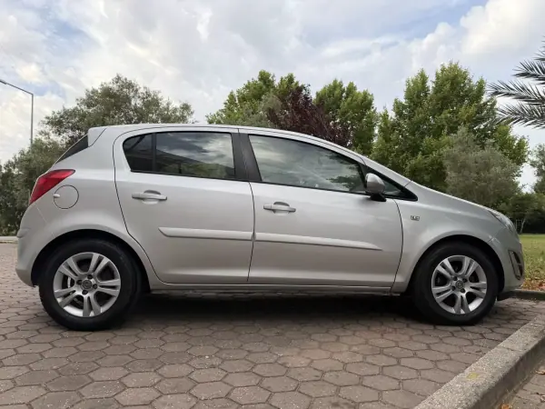 Opel Corsa 2013 - 7465 EUR, 99000 km - AUTO.MOTO.pt - 99000km - foto 13 de 41
