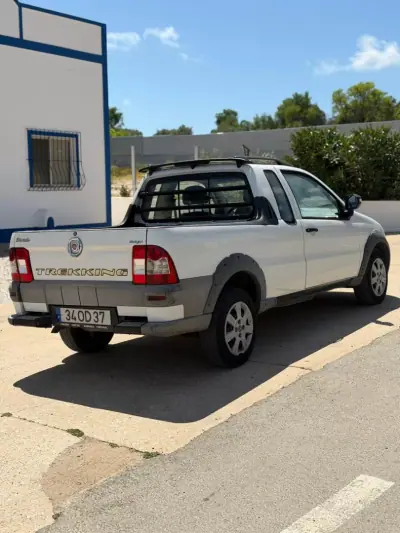 Fiat Strada 1.9 JTD 2013 - 9990 EUR, 276360 km - AUTO.MOTO.pt - 276360km - foto 6 de 7