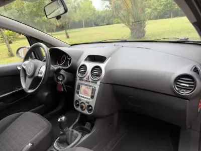 Opel Corsa 2013 - 7465 EUR, 99000 km - AUTO.MOTO.pt - 99000km - foto 22 de 41