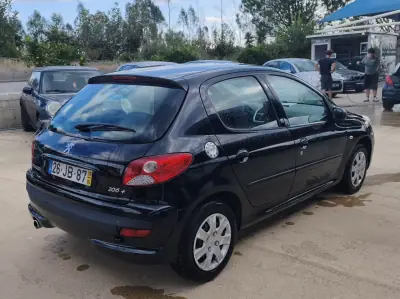 Peugeot 206 2010 — foto 5 de 26