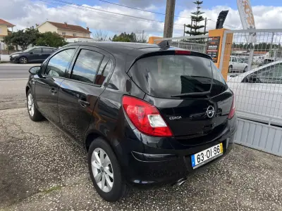 Opel Corsa 2014 - 6450 EUR, 136121 km - AUTO.MOTO.pt - 136121km - foto 12 de 23