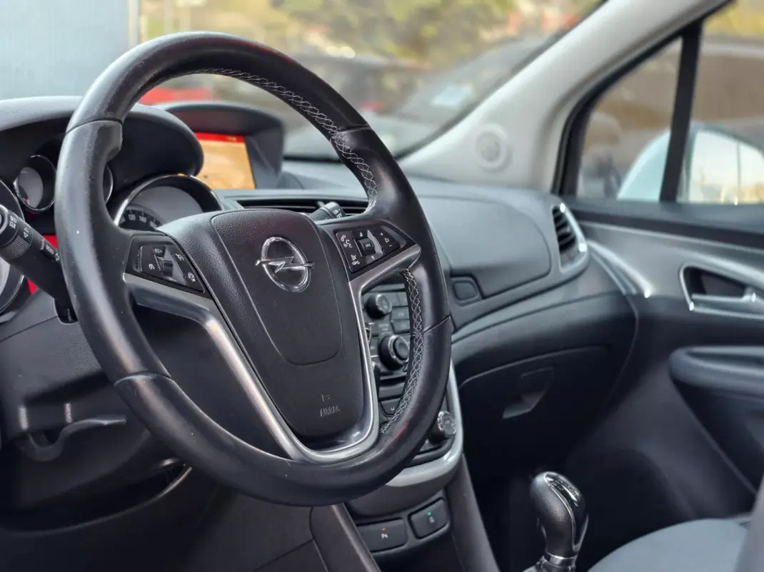 Opel Mokka 2016 - 12500 EUR, 135000 km - AUTO.MOTO.pt - 135000km - foto 11 de 18