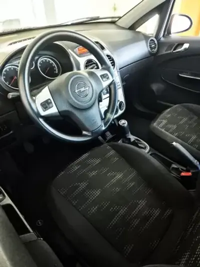 Opel Corsa 2013 - 8250 EUR, 55000 km - AUTO.MOTO.pt - 55000km - foto 6 de 9