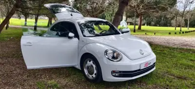 Volkswagen New Beetle 2015 - 14950 EUR, 156200 km - AUTO.MOTO.pt - 156200km - foto 18 de 39